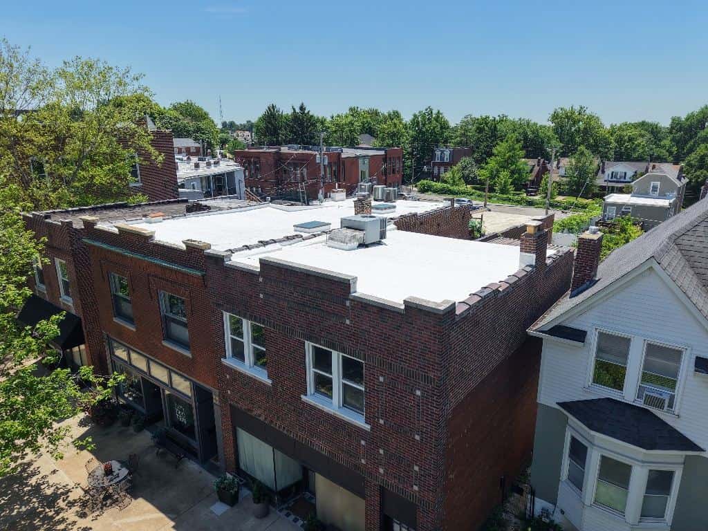 Aerial view of a flat roof on a brick commercial building